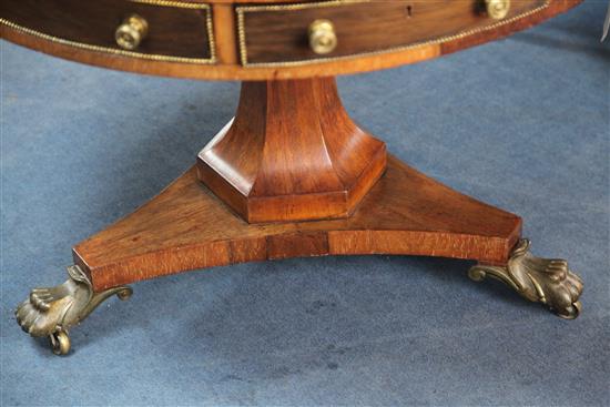 A 19th century circular rosewood drum table, stamped Gregory & Co, Regent Street, London, W.3ft 6in.